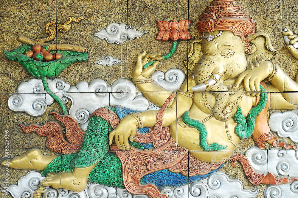 Fototapeta premium ganesh concrete carving on the wall