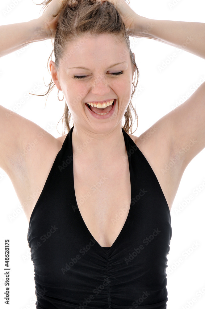 Fototapeta premium Junge Frau in schwarzem Abendkleid lacht