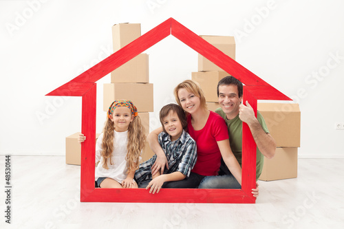 Canvas Print Happy family moving into a new home