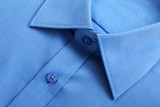 Close up view of blue business shirt.