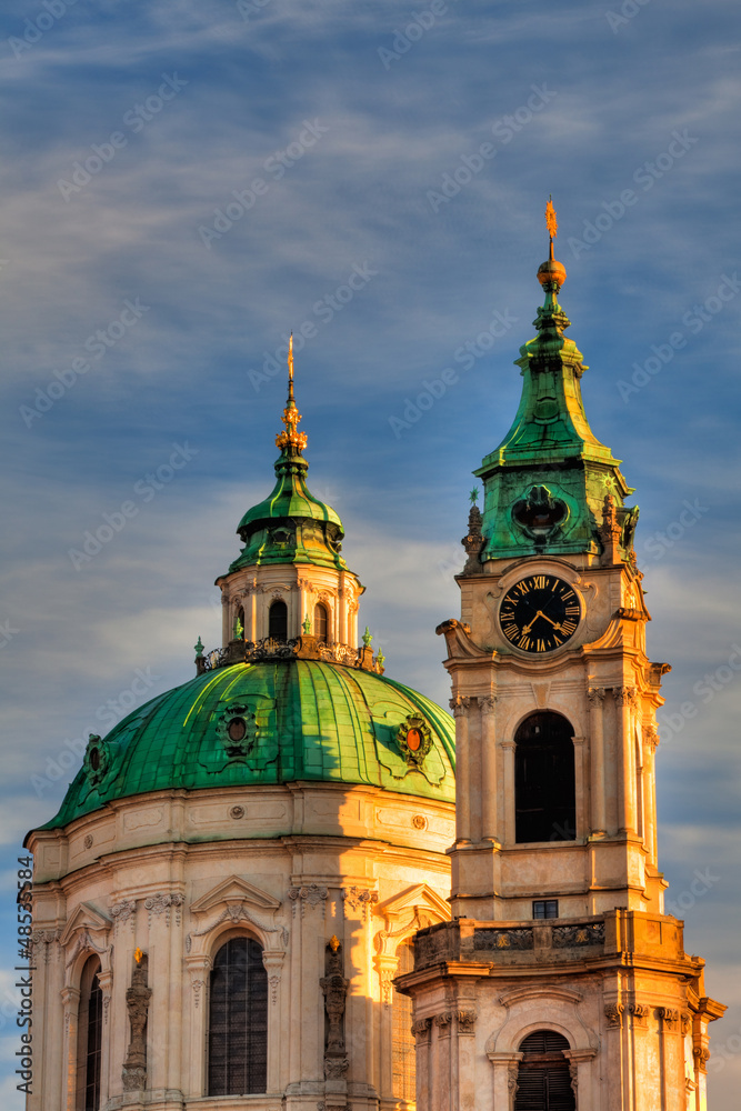 Famous St Nicholas church in Prague at sunrise