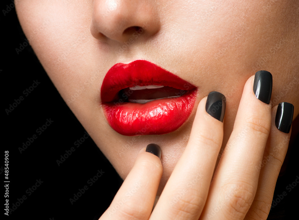 Naklejka premium Makeup and Manicure. Black Nails and Red Lips
