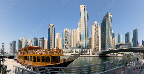 Dubai Marina port with skyscrapers photo