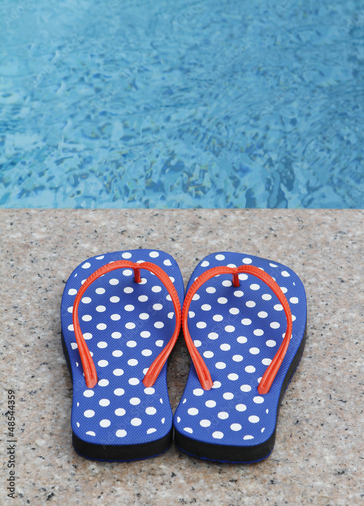 Naklejka premium Flip-Flops By The Pool