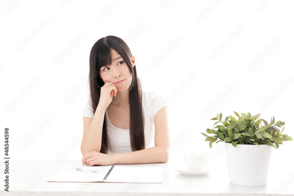 attractive asian woman studying on white background attractive asian woman studying on white background