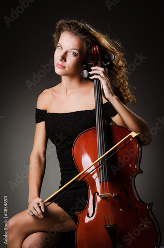 Woman performer with cello  in studio