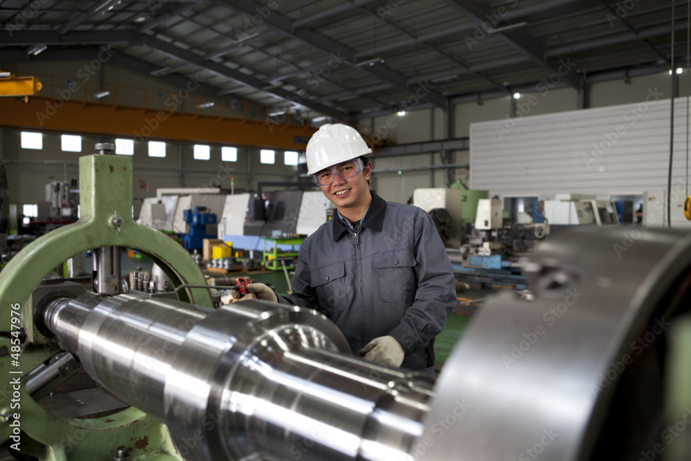 Fototapeta premium asian technician working in factory