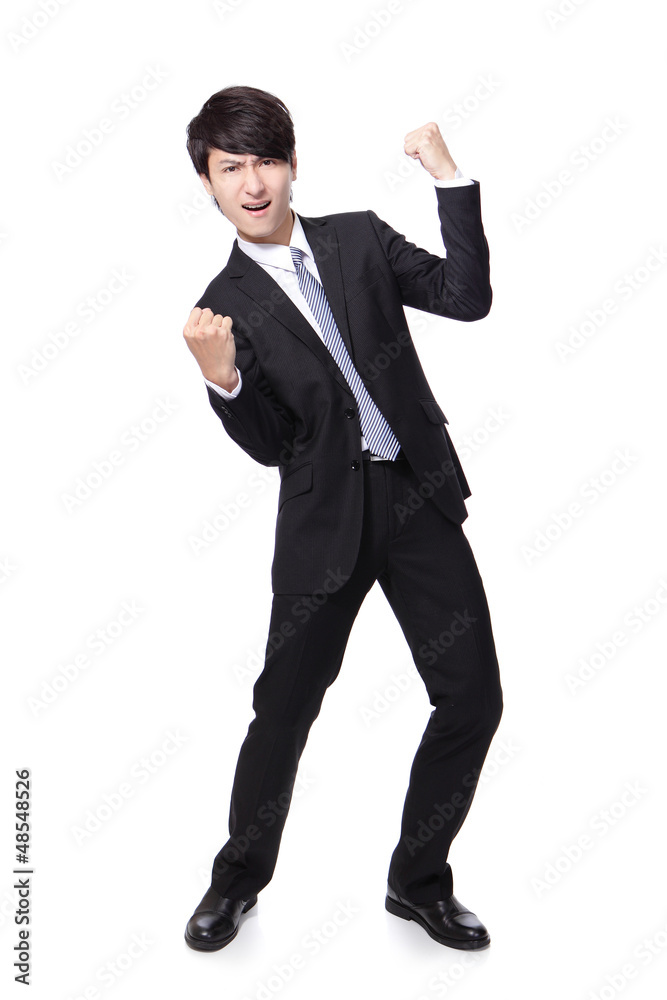 handsome business man with arms raised in success handsome business man with arms raised in success