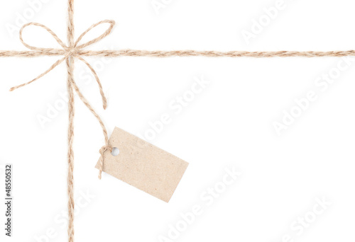 Rope bow tag . Jute wrapping for present and pricing. Close up.