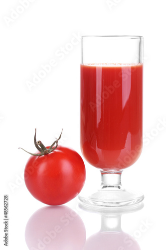 Tomato juice in glass isolated on white