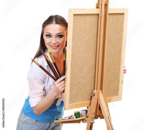 beautiful young woman painter with brushes, isolated on white