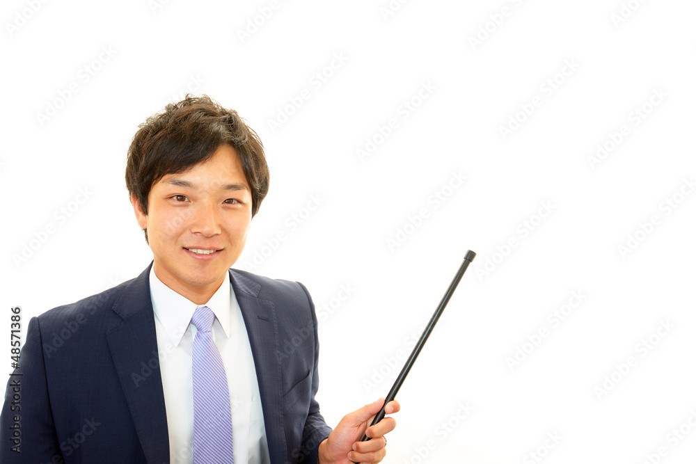 指示棒を持つ笑顔のビジネスマン 指示棒を持つ笑顔のビジネスマン