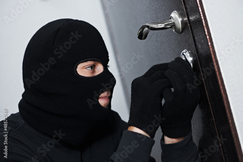 burglar thief at house breaking