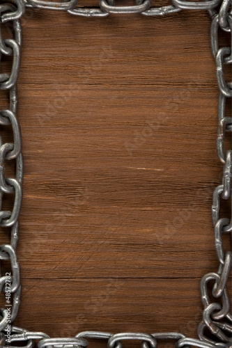 metal chain on wood