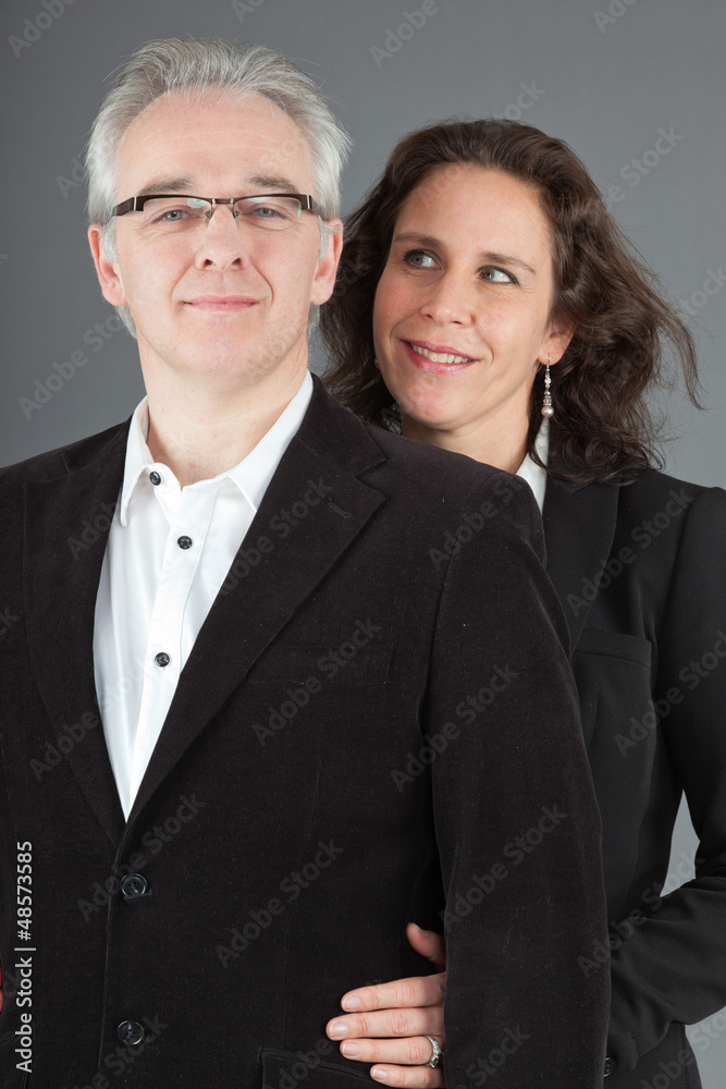 Happy middle aged couple. Man and woman. Studio shot. Happy middle aged couple. Man and woman. Studio shot.