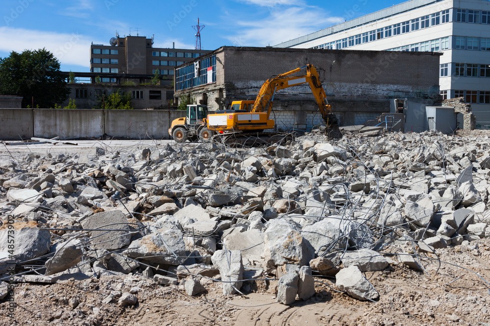 digger demolishing houses for reconstruction digger demolishing houses for reconstruction