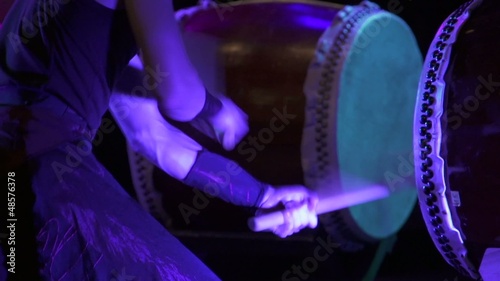 anonymous taiko drummer performing on stage