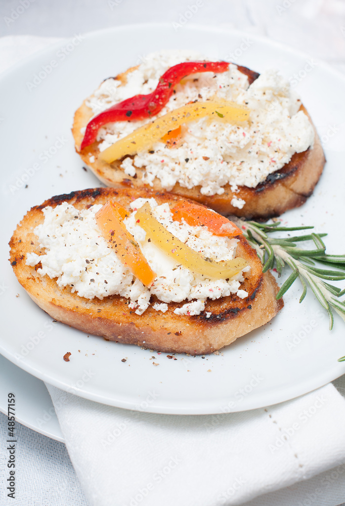 appetizer, toast with cheese, pepper and rosemary