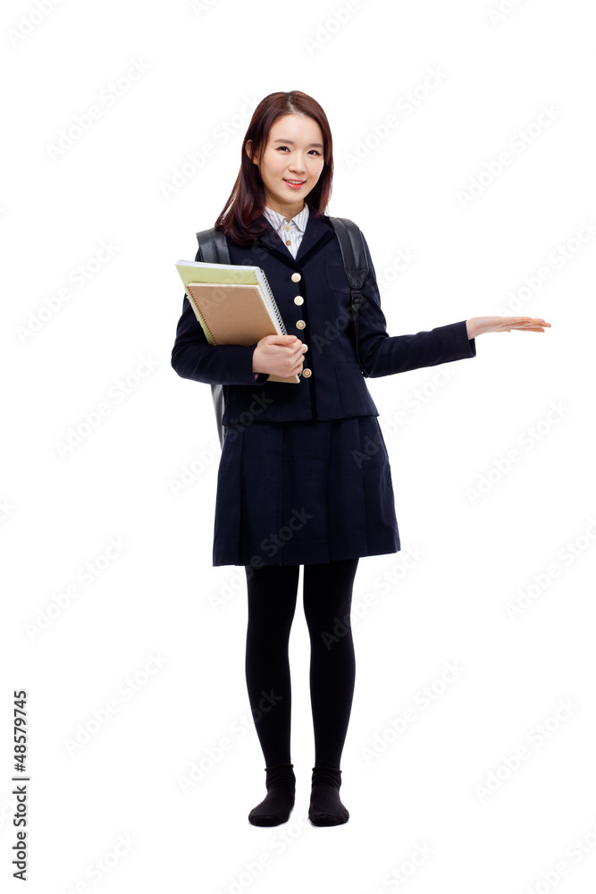 Young pretty Asian student indicate side space Young pretty Asian student indicate side space