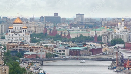 Krymsky bridge stands in front of Temple of Christ of Savior