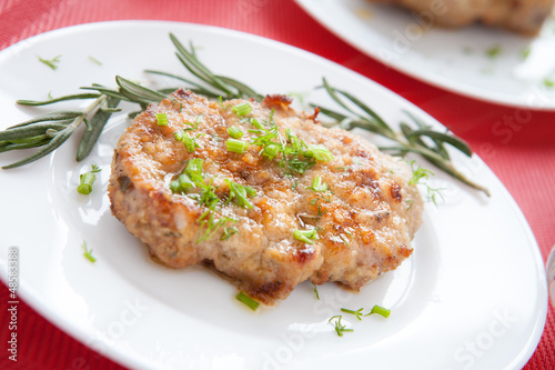 Hot pork cutlet with greens