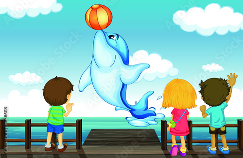 Kids and dolphin
