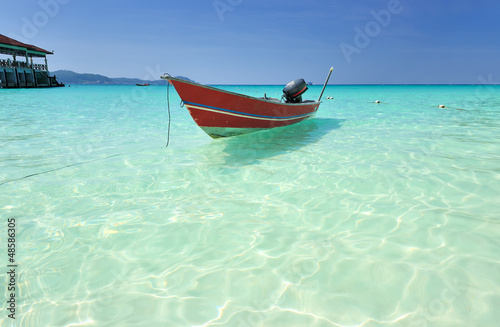 Beautiful beach with motor boat