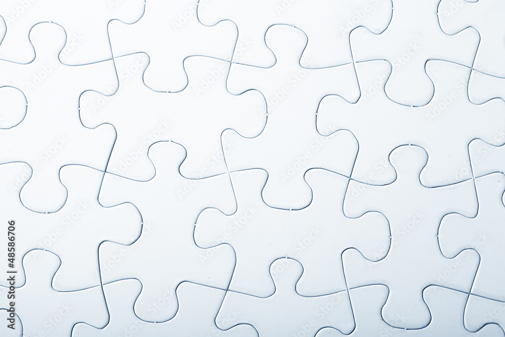 Jigsaw puzzle with blank white pieces Jigsaw puzzle with blank white pieces