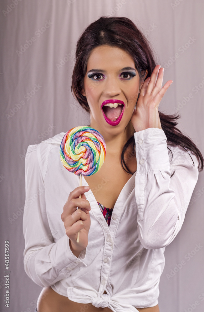 beautiful girl with a lollipop