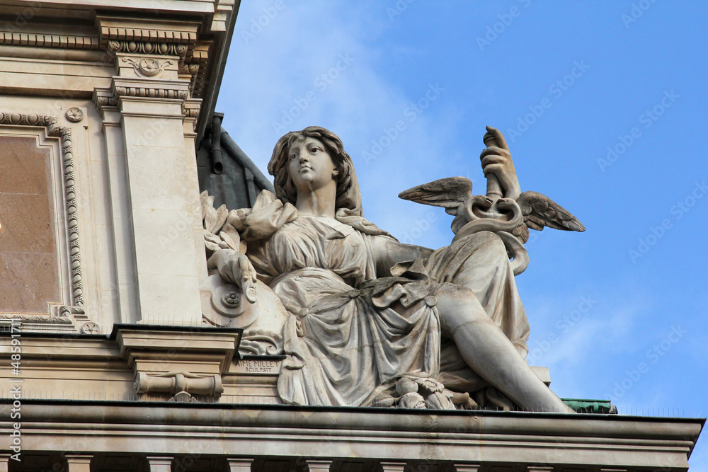 Obraz premium Statue of commerce on the BNP building in Paris