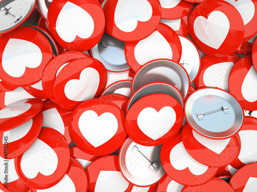 Buttons with white hearts isolated on background photo