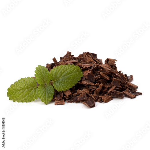 Crushed chocolate shavings pile and mint leaf