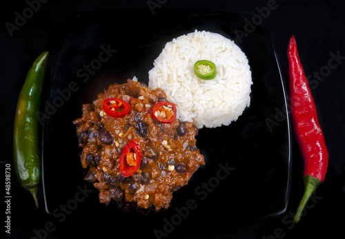 Tableau sur toile Chili con carne with black beans and red peppers