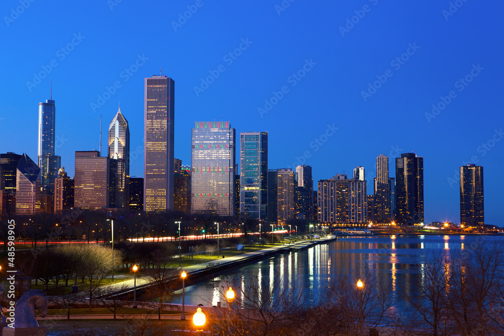 Downtown Chicago across Lake Michigan at dusk, IL, USA