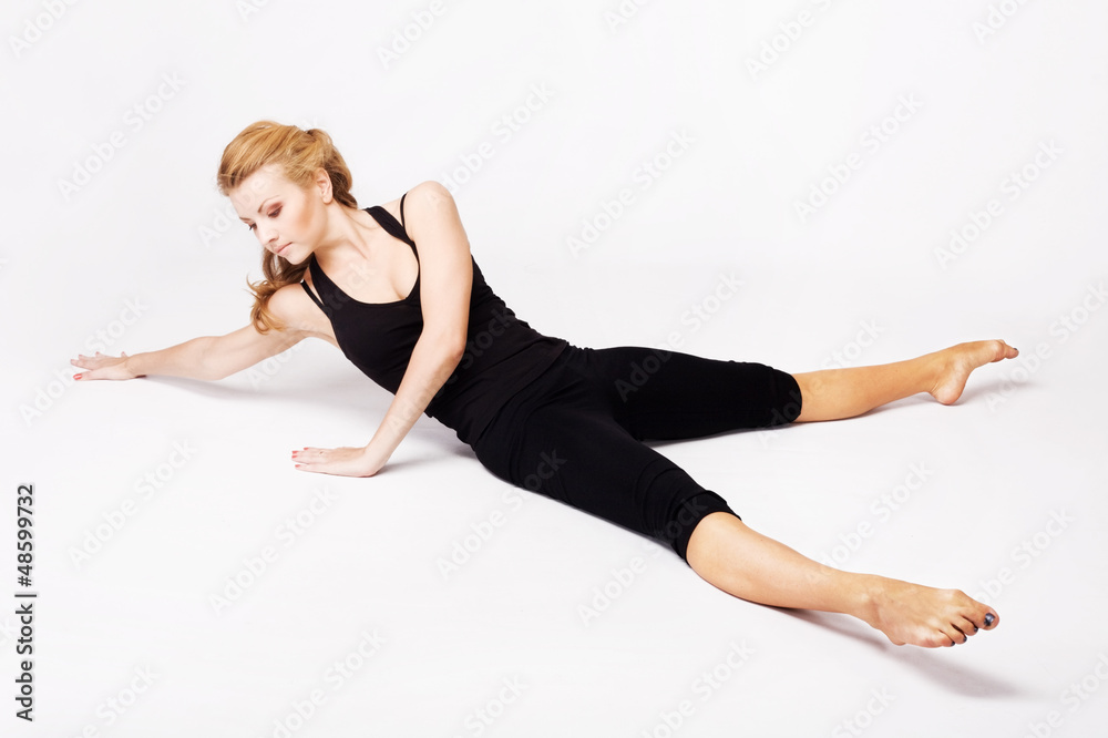 Beautiful woman doing stretching exercise Beautiful woman doing stretching exercise