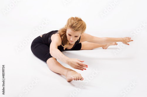 Beautiful woman doing stretching exercise