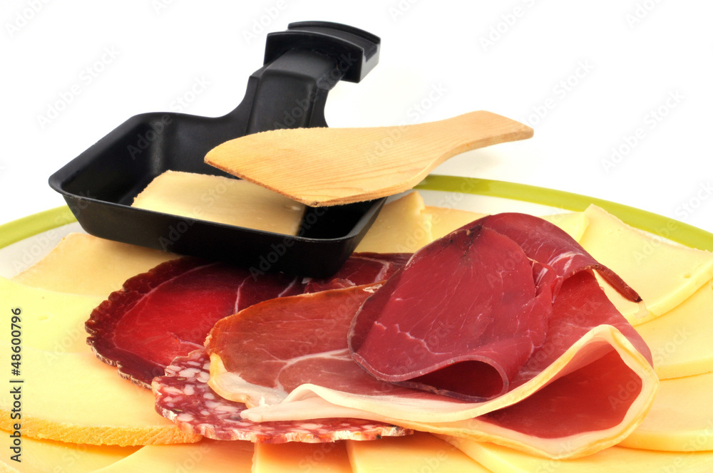 L'assiette de fromage à raclette et charcuterie Stock Photo | Adobe Stock
