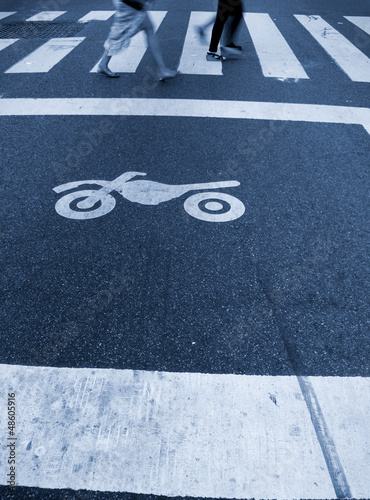 Crosswalk and motorcycle symbol