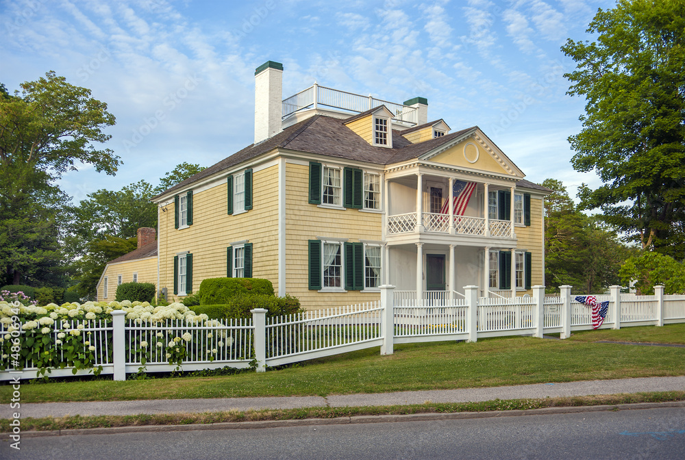 Fototapeta premium A 1790's federal style wood home.