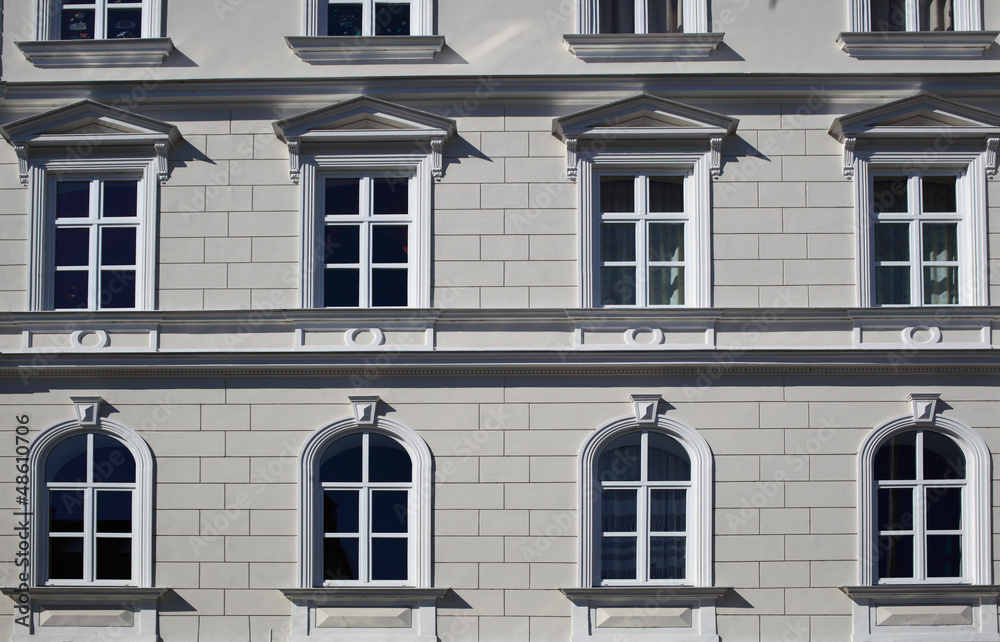 Windows on old style building facade