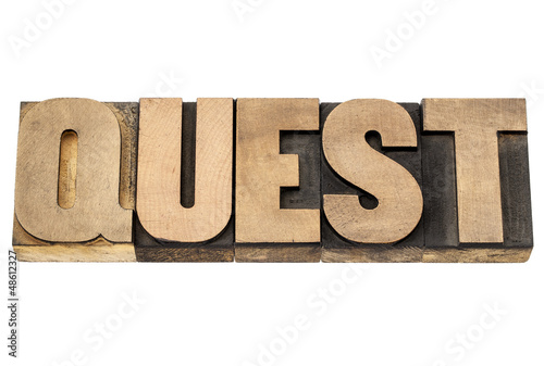 quest word in wood type photo