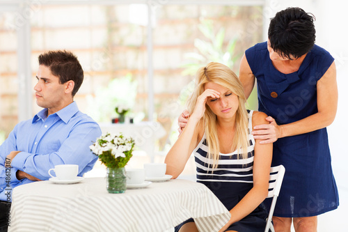 Bild auf Leinwand mother comforting daughter when has relationship difficulties