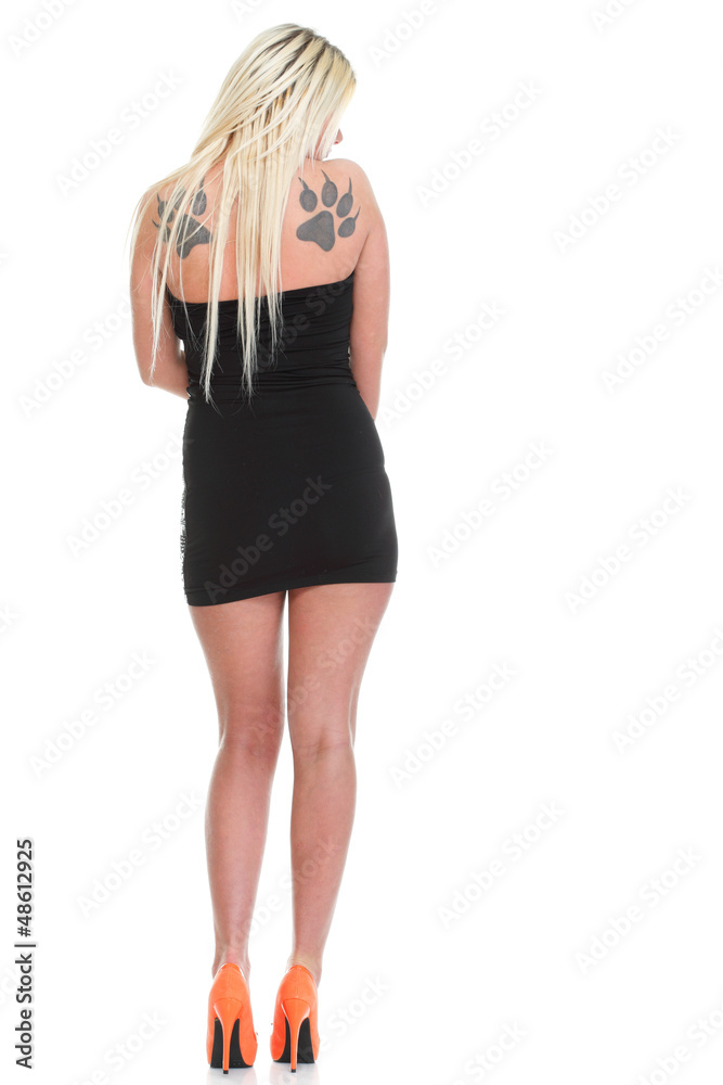 Fototapeta premium blondie girl with tattoo on her back isolated