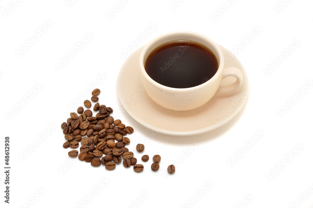 Obraz premium cup of coffee and coffee beans on a white background