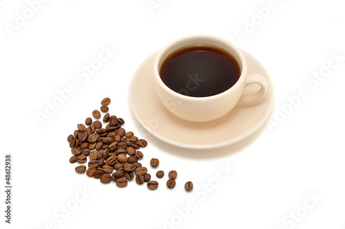cup of coffee and coffee beans on a white background