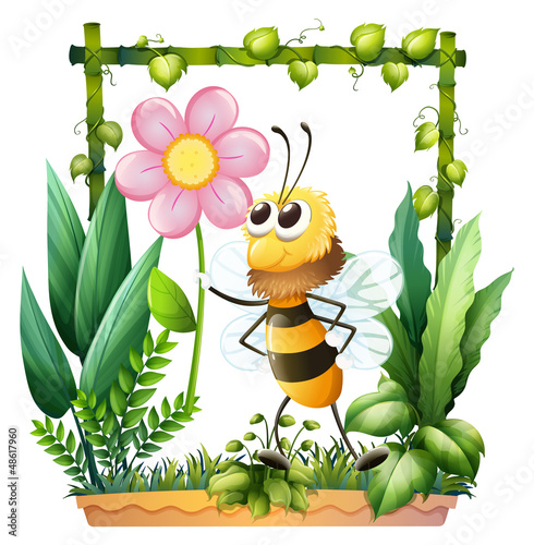 A bee holding a pink flower