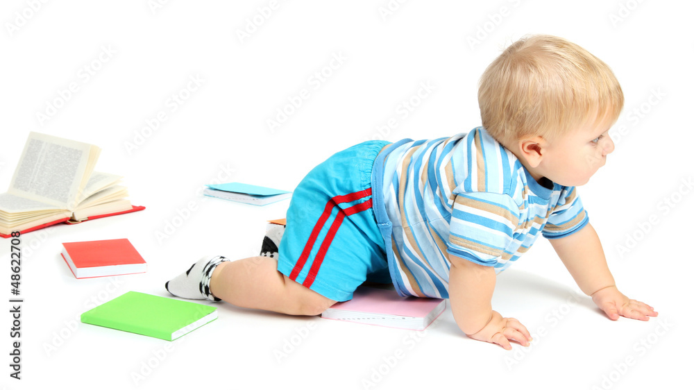 Little boy with multicolor books, isolated on white