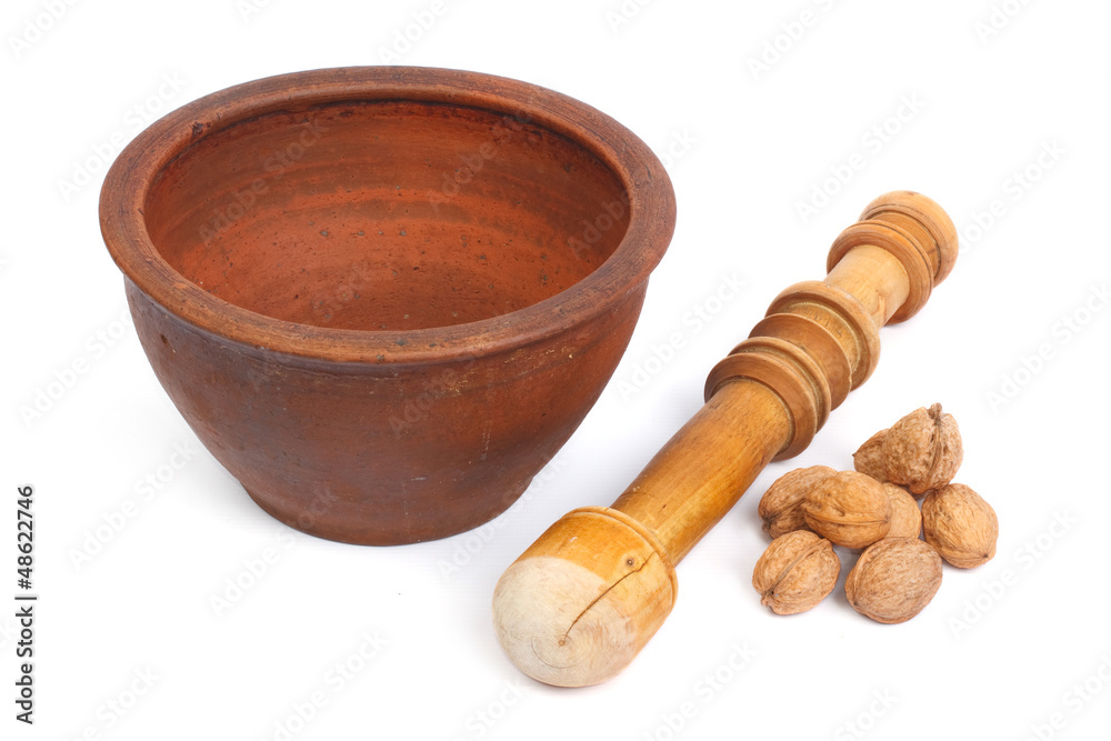 Walnuts and mortar for grinding
