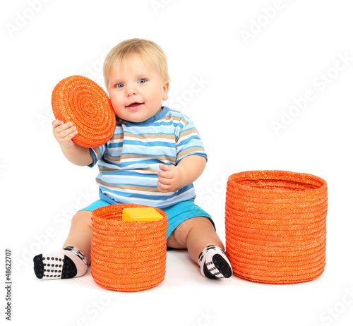 Little boy playing with col...