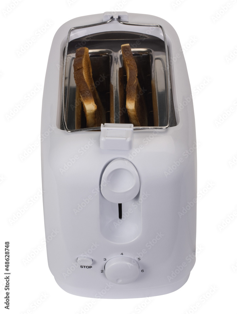 Close-up of a toaster with toasts Close-up of a toaster with toasts